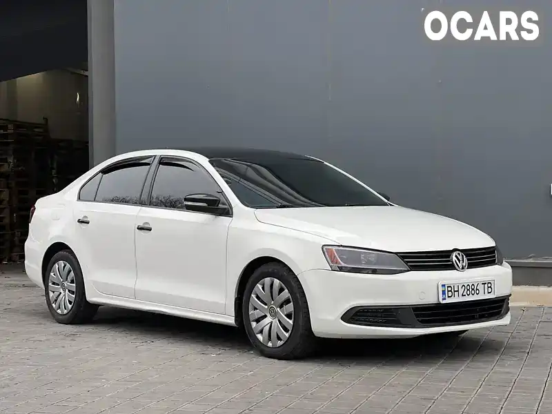 Седан Volkswagen Jetta 2013 1.8 л. Автомат обл. Одеська, Одеса - Фото 1/21