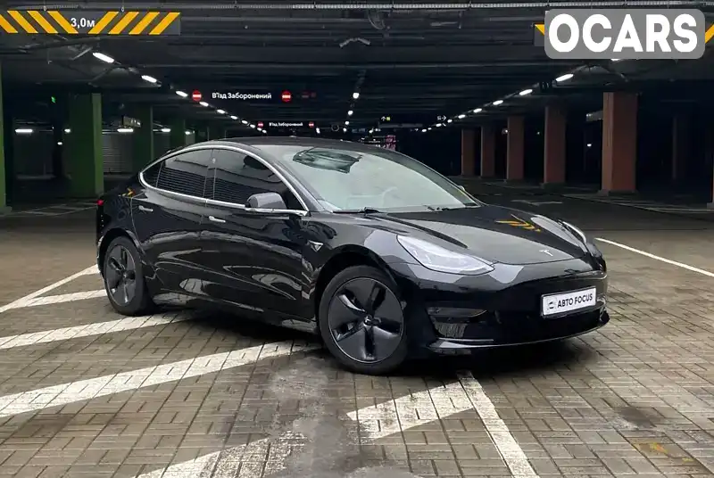 Седан Tesla Model 3 2018 null_content л. Автомат обл. Киевская, Киев - Фото 1/21