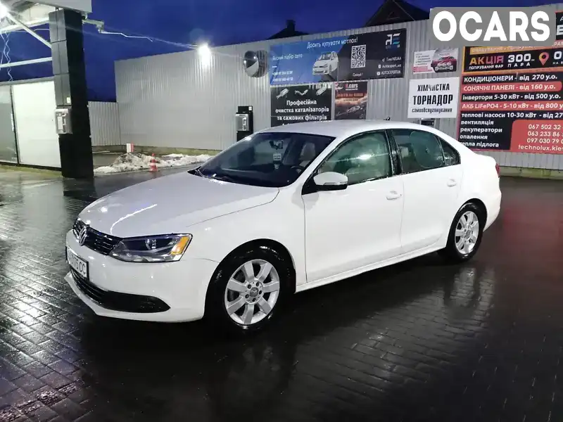 Седан Volkswagen Jetta 2013 1.8 л. Автомат обл. Київська, Київ - Фото 1/8