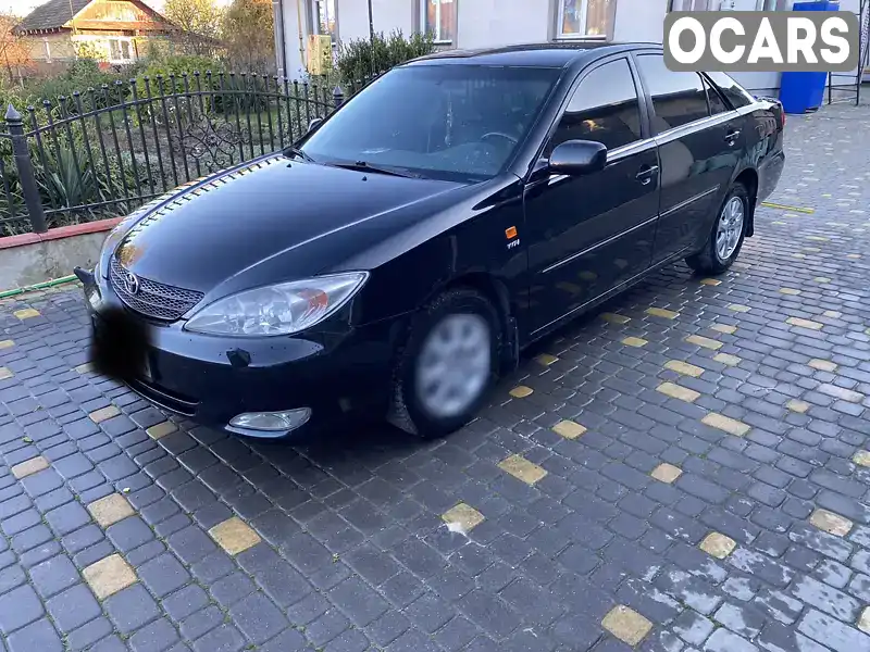 Седан Toyota Camry 2004 2.37 л. Автомат обл. Волынская, Нововолынск - Фото 1/21