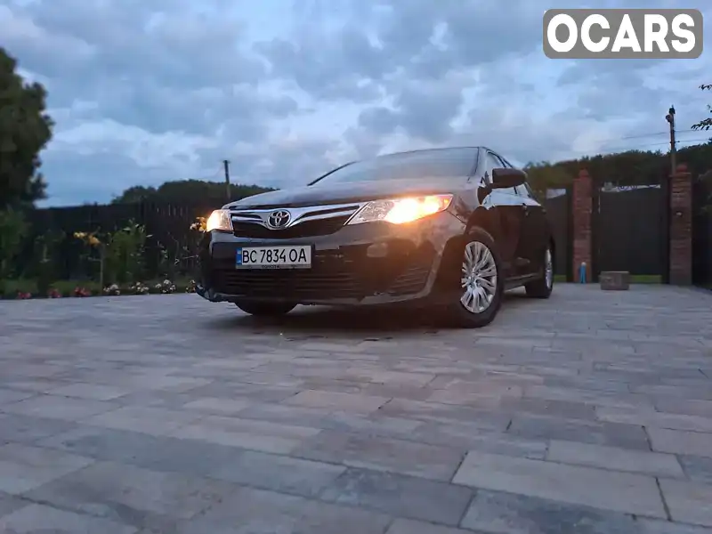 Седан Toyota Camry 2014 2.49 л. Автомат обл. Львовская, Львов - Фото 1/21