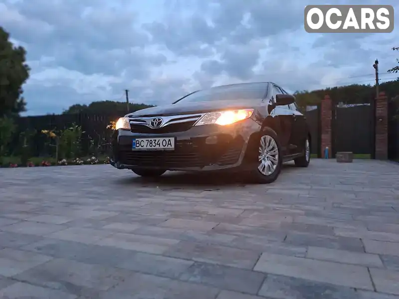 Седан Toyota Camry 2014 2.49 л. Автомат обл. Львівська, Львів - Фото 1/21