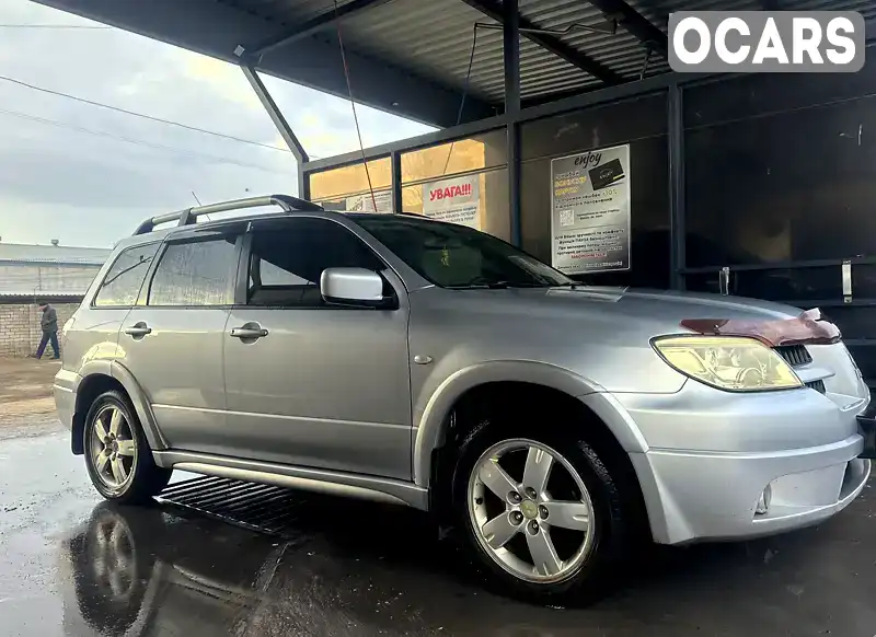 Внедорожник / Кроссовер Mitsubishi Outlander 2007 2.4 л. Автомат обл. Днепропетровская, Днепр (Днепропетровск) - Фото 1/12