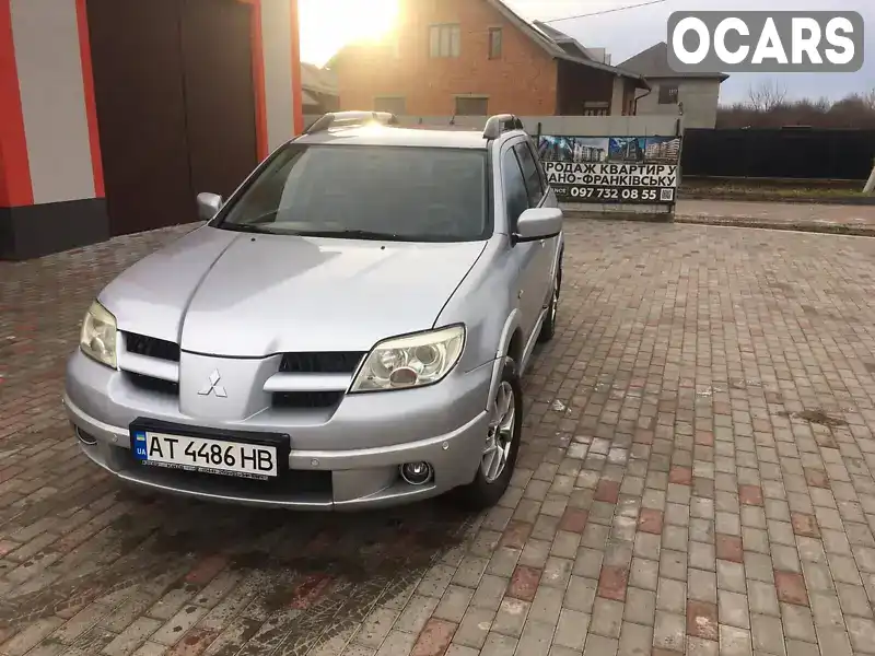 Внедорожник / Кроссовер Mitsubishi Outlander 2007 2.38 л. Автомат обл. Ивано-Франковская, Городенка - Фото 1/12