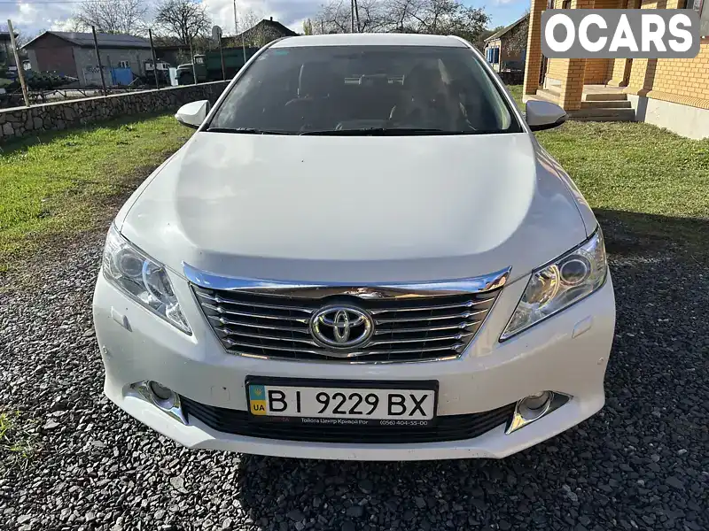 Седан Toyota Camry 2011 2.5 л. Автомат обл. Полтавская, Горишние Плавни (Комсомольск) - Фото 1/13