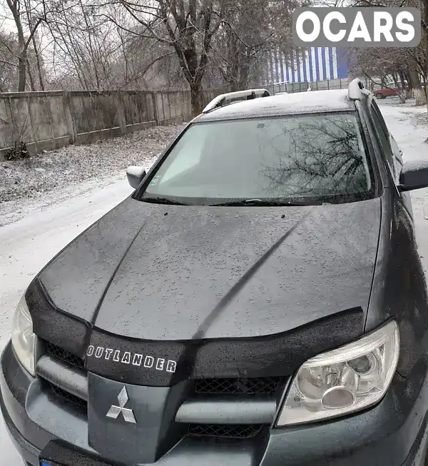 Внедорожник / Кроссовер Mitsubishi Outlander 2004 2.4 л. Ручная / Механика обл. Закарпатская, Ужгород - Фото 1/9