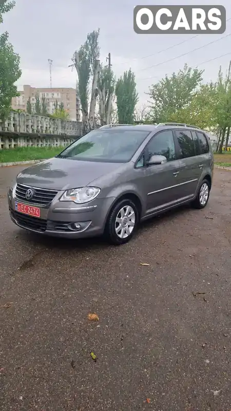 Мінівен Volkswagen Touran 2008 2 л. Ручна / Механіка обл. Миколаївська, Миколаїв - Фото 1/21