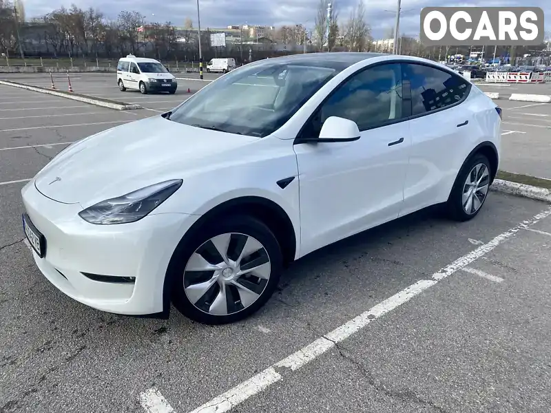 Внедорожник / Кроссовер Tesla Model Y 2023 null_content л. Автомат обл. Киевская, Киев - Фото 1/21