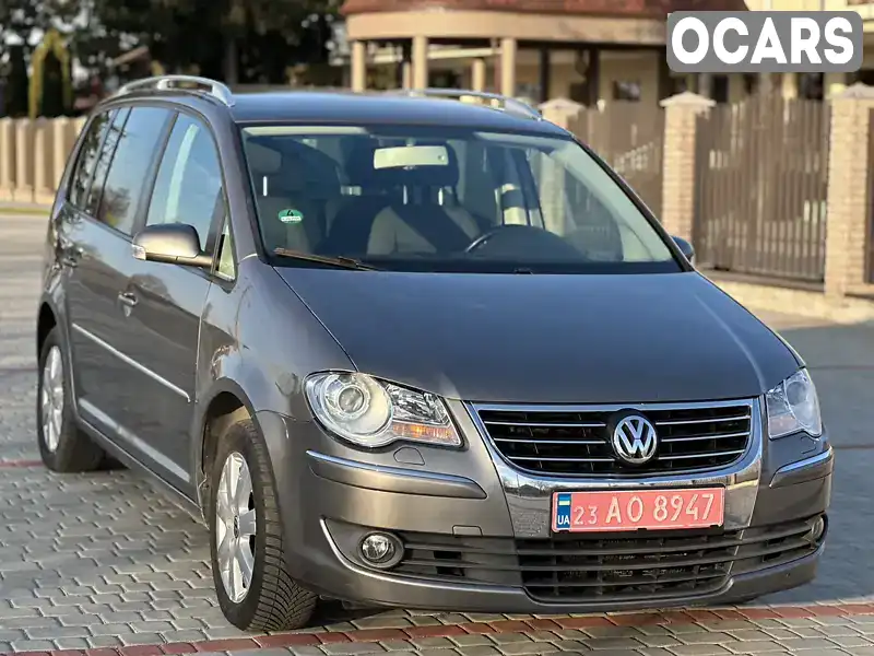 Минивэн Volkswagen Touran 2008 1.4 л. Автомат обл. Хмельницкая, Староконстантинов - Фото 1/21