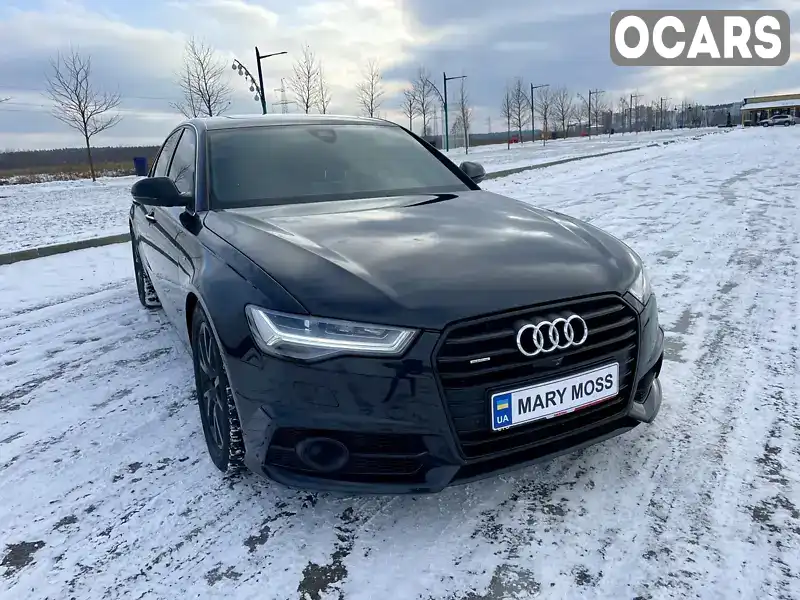 Седан Audi A6 2014 3 л. Автомат обл. Київська, Буча - Фото 1/21