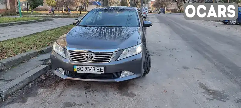 Седан Toyota Camry 2014 2.49 л. Автомат обл. Львівська, Львів - Фото 1/21