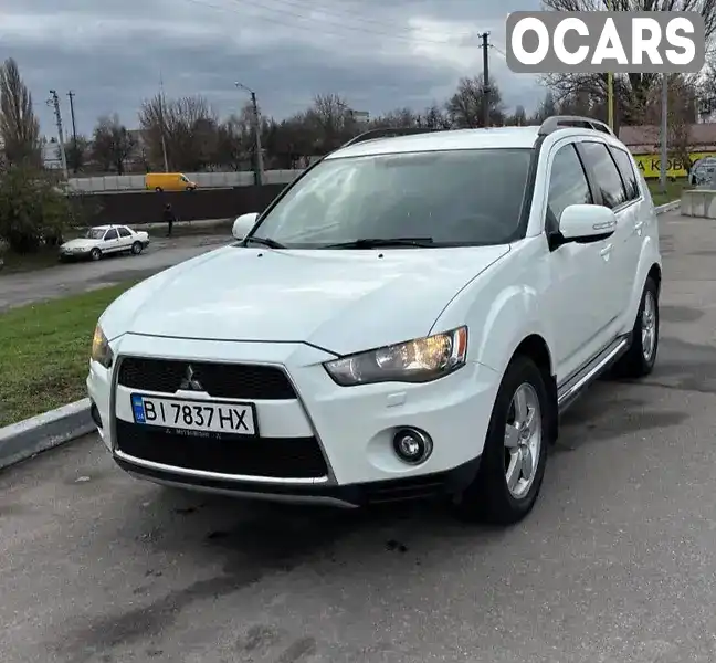 Внедорожник / Кроссовер Mitsubishi Outlander 2010 2.4 л. Вариатор обл. Полтавская, Кременчуг - Фото 1/12