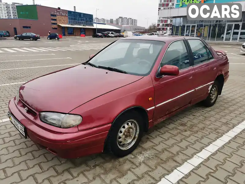 Седан Hyundai Lantra 1994 1.47 л. Ручная / Механика обл. Киевская, Вышневое - Фото 1/16