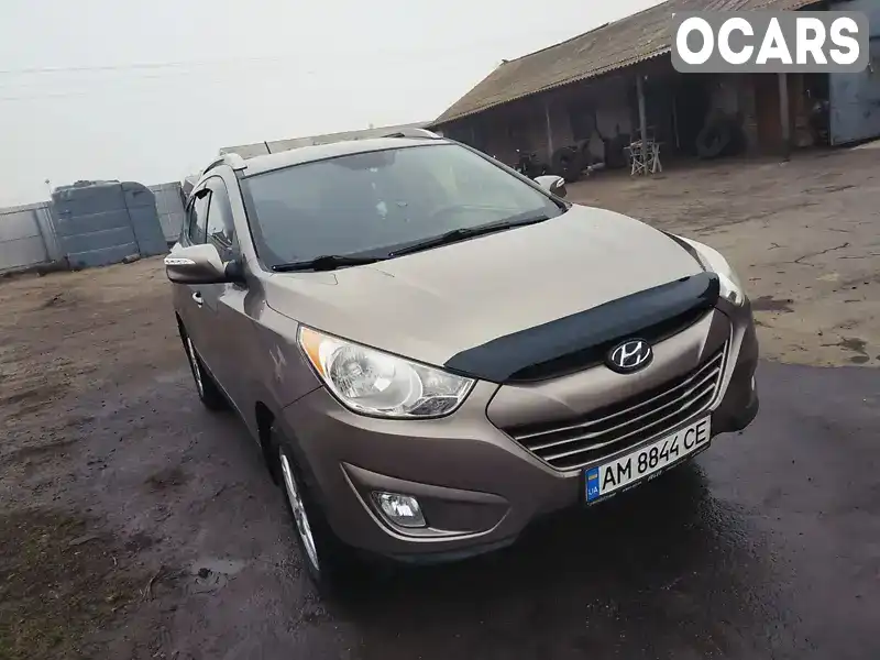 Позашляховик / Кросовер Hyundai Tucson 2011 2.4 л. Автомат обл. Житомирська, Романів - Фото 1/12