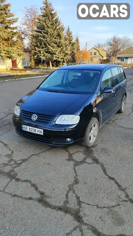 Мінівен Volkswagen Touran 2004 1.6 л. Ручна / Механіка обл. Миколаївська, Миколаїв - Фото 1/5