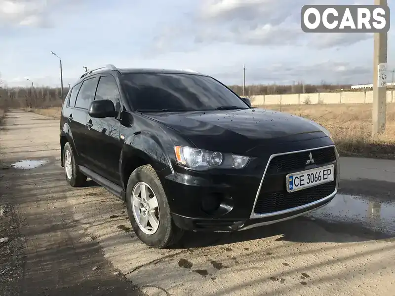 Внедорожник / Кроссовер Mitsubishi Outlander XL 2010 2 л. Ручная / Механика обл. Черновицкая, Черновцы - Фото 1/21