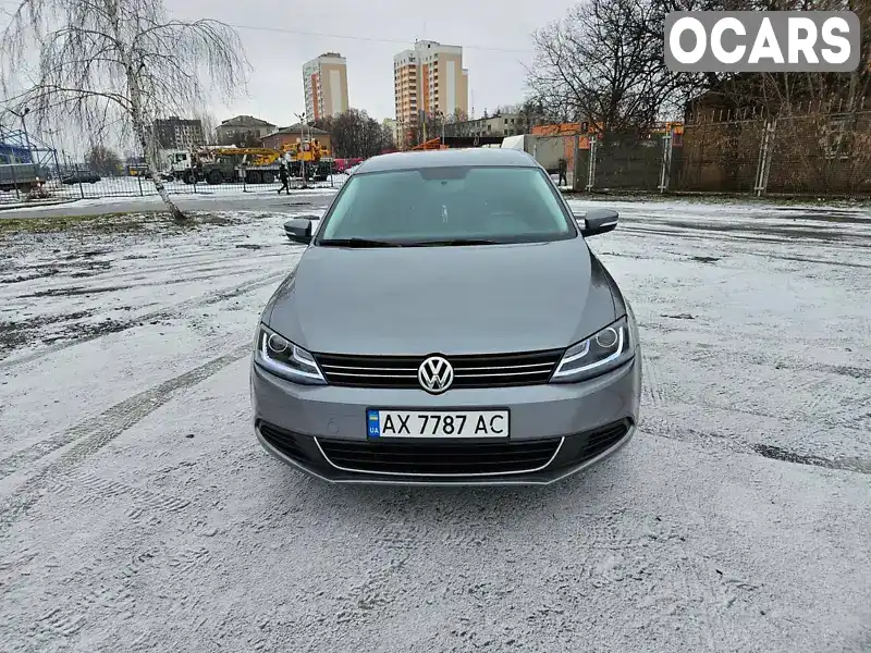 Седан Volkswagen Jetta 2014 1.8 л. Автомат обл. Харьковская, Харьков - Фото 1/10
