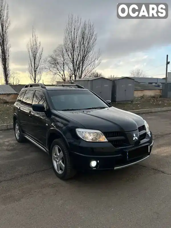 Позашляховик / Кросовер Mitsubishi Outlander 2008 2.38 л. Типтронік обл. Миколаївська, Вознесенськ - Фото 1/21