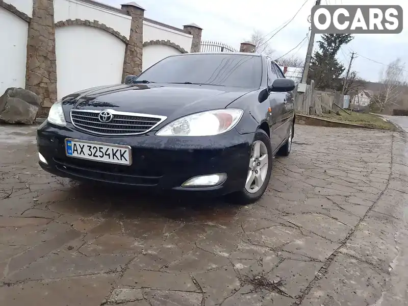 Седан Toyota Camry 2003 2.4 л. Автомат обл. Харьковская, Харьков - Фото 1/21