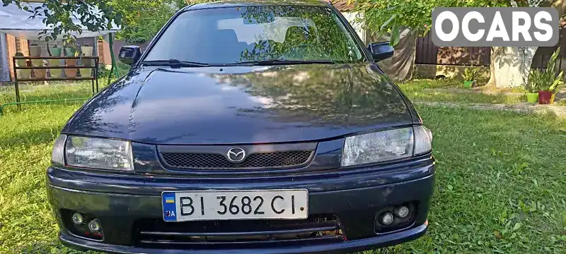 Седан Mazda 323 1997 1.49 л. Ручная / Механика обл. Полтавская, Полтава - Фото 1/21