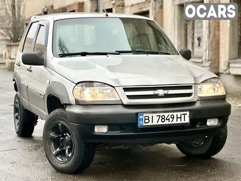 Внедорожник / Кроссовер Chevrolet Niva 2007 1.69 л. Ручная / Механика обл. Полтавская, Горишние Плавни (Комсомольск) - Фото 1/21