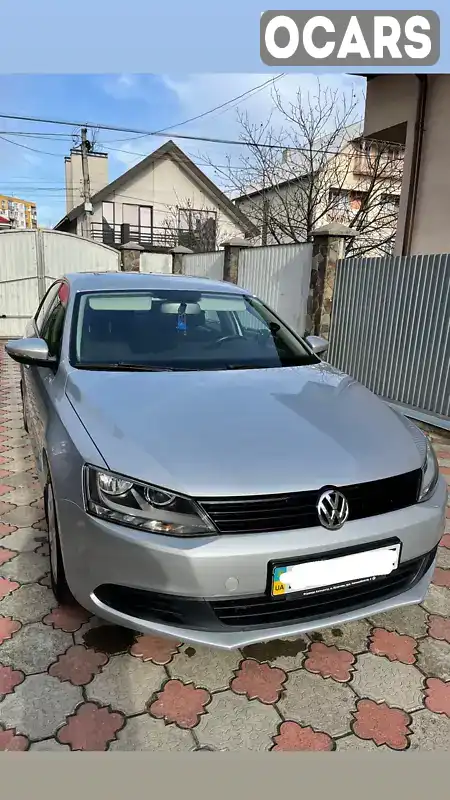 Седан Volkswagen Jetta 2014 1.97 л. Ручна / Механіка обл. Закарпатська, Мукачево - Фото 1/21