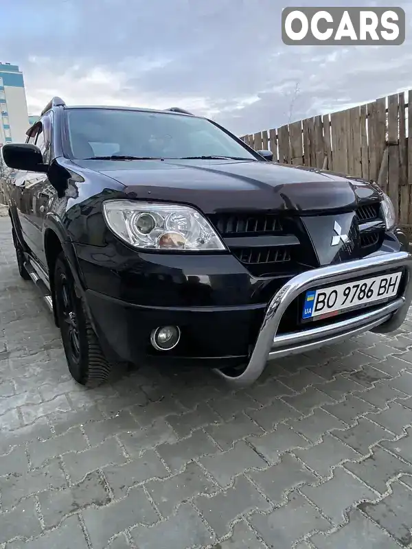 Внедорожник / Кроссовер Mitsubishi Outlander 2008 2.38 л. Типтроник обл. Хмельницкая, Хмельницкий - Фото 1/21