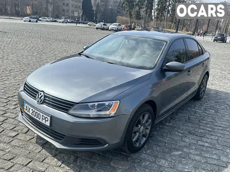 Седан Volkswagen Jetta 2013 1.98 л. Автомат обл. Харьковская, Харьков - Фото 1/15