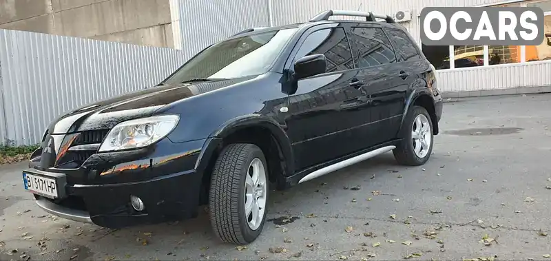 Внедорожник / Кроссовер Mitsubishi Outlander 2009 2 л. Ручная / Механика обл. Полтавская, Полтава - Фото 1/14