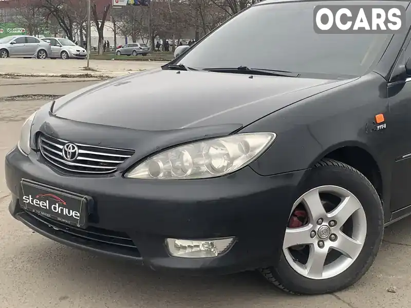 Седан Toyota Camry 2006 2.4 л. Автомат обл. Миколаївська, Миколаїв - Фото 1/21