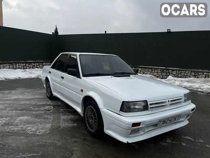 Седан Nissan Bluebird 1990 1.6 л. Ручная / Механика обл. Хмельницкая, Волочиск - Фото 1/21