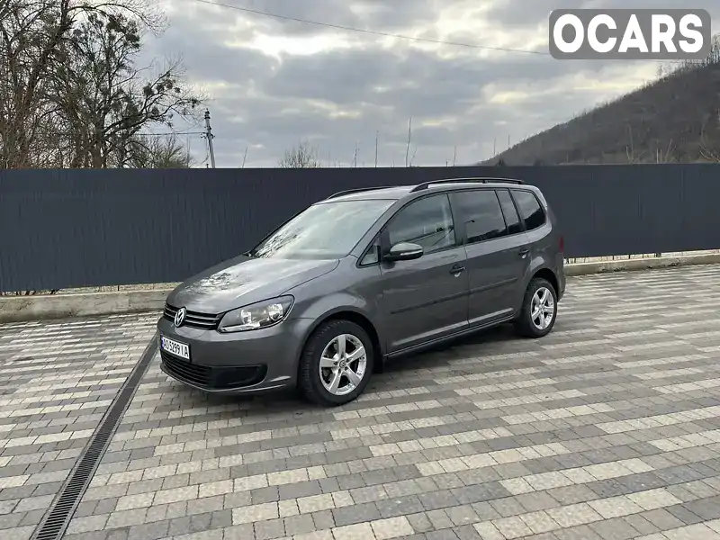 Микровэн Volkswagen Touran 2012 1.6 л. Ручная / Механика обл. Закарпатская, Свалява - Фото 1/21