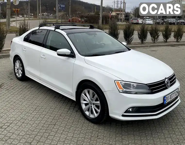 Седан Volkswagen Jetta 2014 1.8 л. Автомат обл. Полтавська, Полтава - Фото 1/21