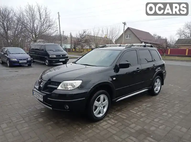 Внедорожник / Кроссовер Mitsubishi Outlander 2008 2 л. Ручная / Механика обл. Черкасская, Звенигородка - Фото 1/16