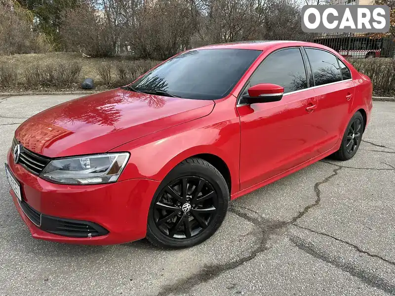 Седан Volkswagen Jetta 2014 1.78 л. Автомат обл. Харківська, Харків - Фото 1/21