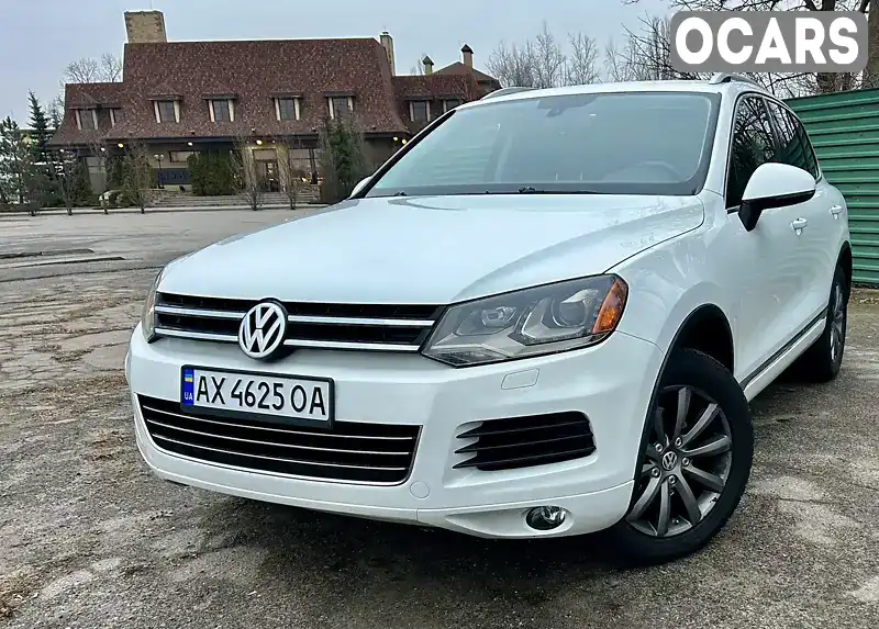 Внедорожник / Кроссовер Volkswagen Touareg 2012 3 л. Автомат обл. Харьковская, Харьков - Фото 1/14