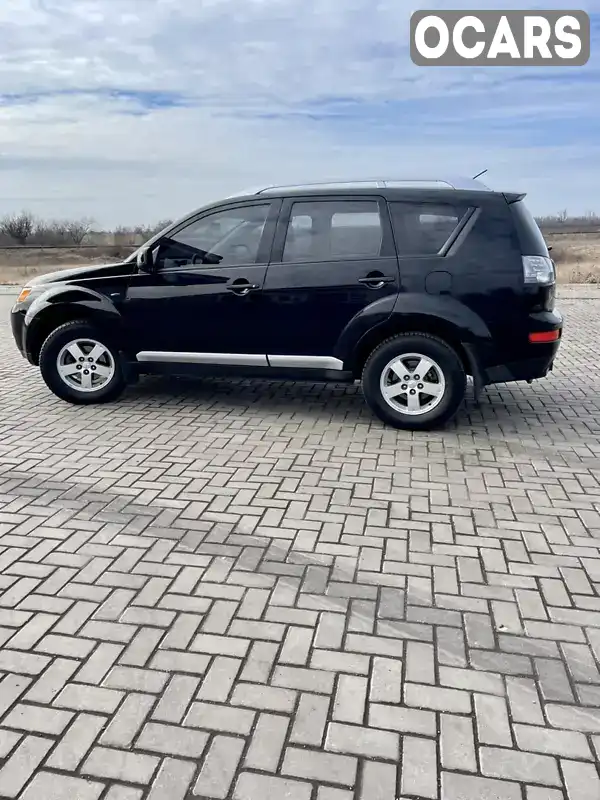 Позашляховик / Кросовер Mitsubishi Outlander 2008 2.4 л. Ручна / Механіка обл. Донецька, Добропілля - Фото 1/14