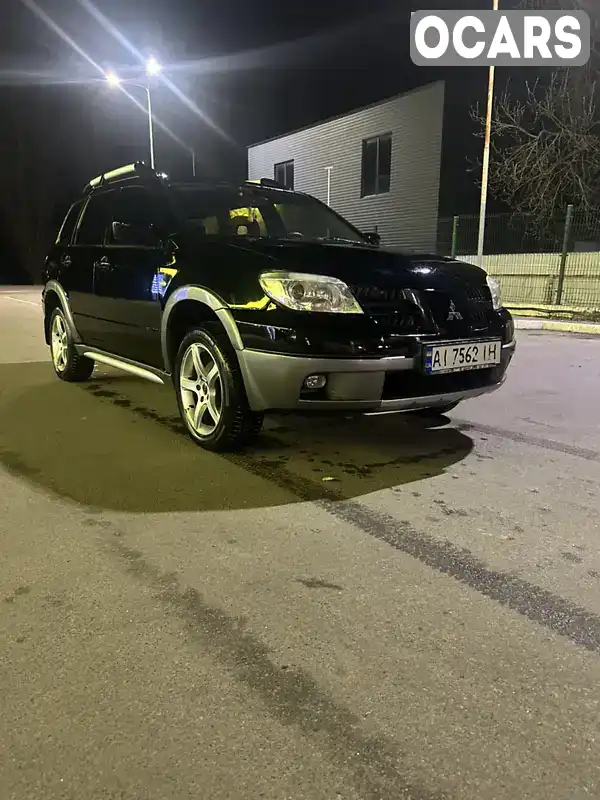 Внедорожник / Кроссовер Mitsubishi Outlander 2005 2.38 л. Автомат обл. Киевская, Киев - Фото 1/21