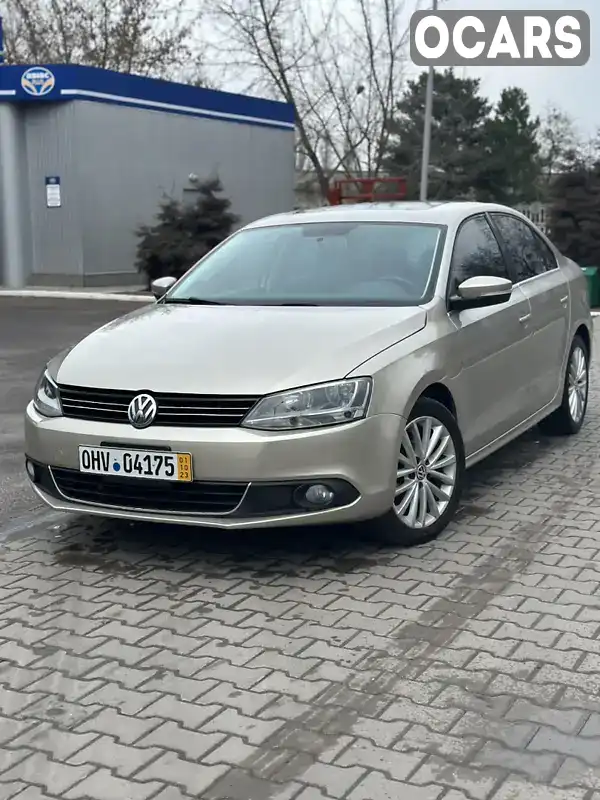 Седан Volkswagen Jetta 2014 1.97 л. Автомат обл. Ровенская, Ровно - Фото 1/20