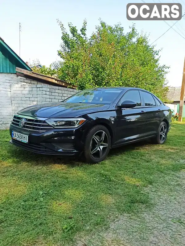 Седан Volkswagen Jetta 2018 1.39 л. Автомат обл. Київська, Вишневе - Фото 1/3