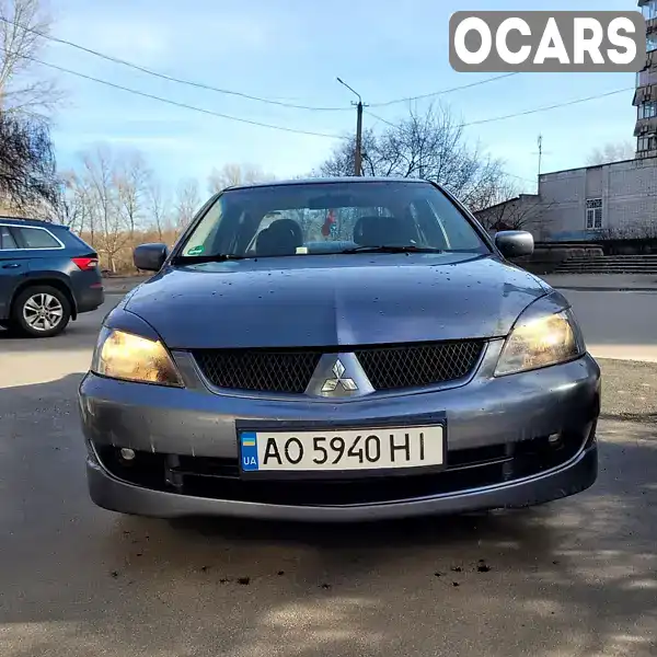 Седан Mitsubishi Lancer 2006 2 л. Ручная / Механика обл. Днепропетровская, Днепр (Днепропетровск) - Фото 1/10