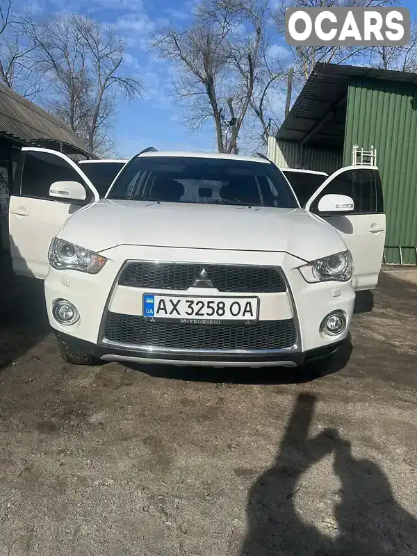 Внедорожник / Кроссовер Mitsubishi Outlander 2011 2.27 л. Ручная / Механика обл. Харьковская, Харьков - Фото 1/21