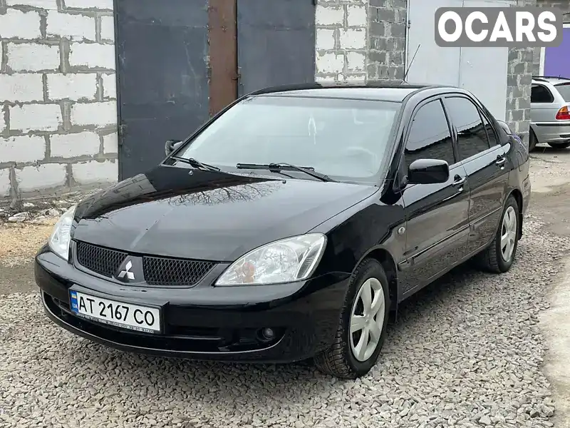 Седан Mitsubishi Lancer 2008 1.6 л. Ручна / Механіка обл. Харківська, Харків - Фото 1/20