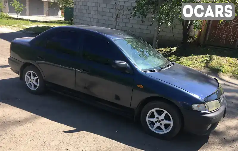 Седан Mazda 323 1997 1.5 л. Ручна / Механіка обл. Рівненська, Дубно - Фото 1/21