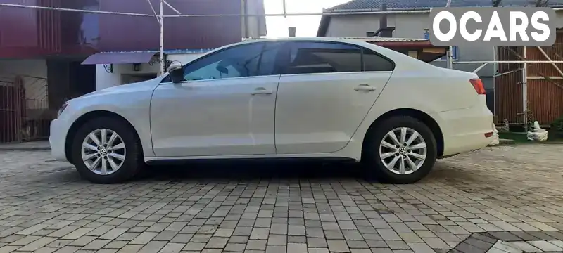 Седан Volkswagen Jetta 2013 1.39 л. Автомат обл. Закарпатська, Ужгород - Фото 1/21