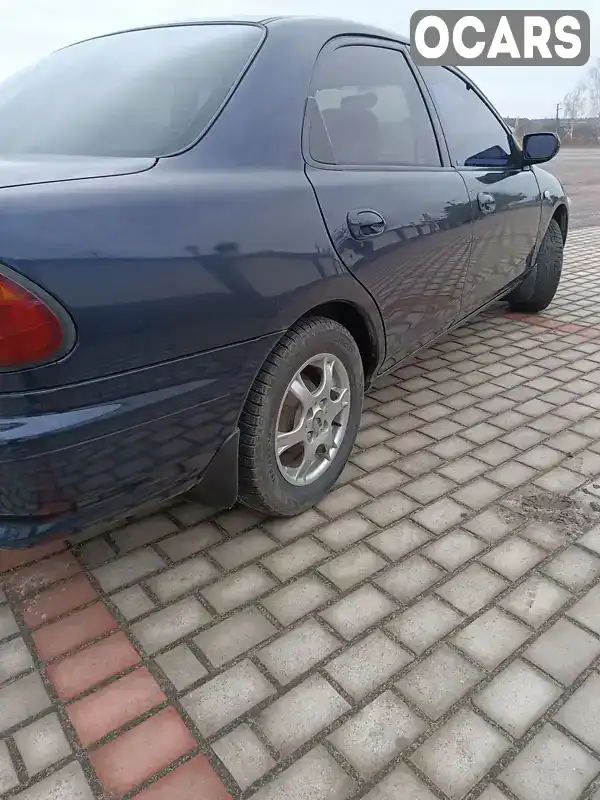 Седан Mazda 323 1997 1.49 л. Ручна / Механіка обл. Житомирська, Житомир - Фото 1/21