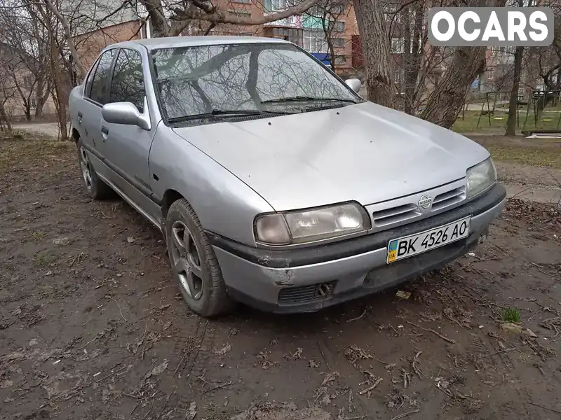 Седан Nissan Primera 1994 1.6 л. Ручная / Механика обл. Хмельницкая, Каменец-Подольский - Фото 1/3