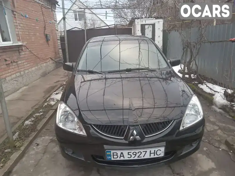 Седан Mitsubishi Lancer 2004 1.58 л. Ручна / Механіка обл. Кіровоградська, Кропивницький (Кіровоград) - Фото 1/7