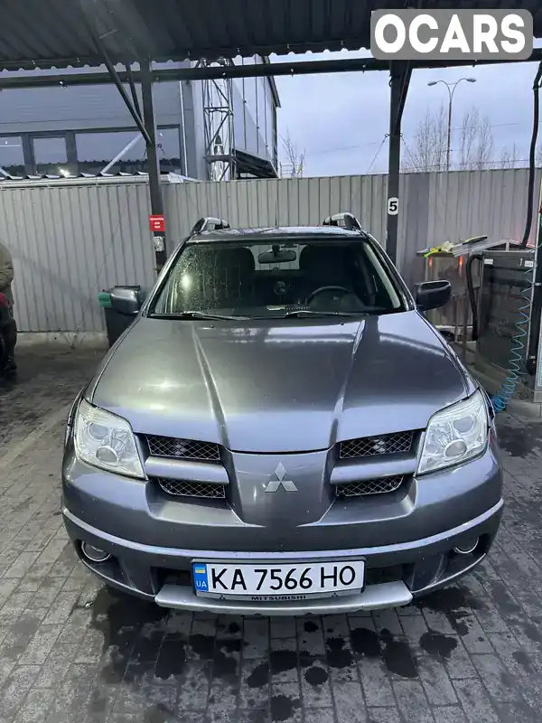 Позашляховик / Кросовер Mitsubishi Outlander 2007 2.4 л. Автомат обл. Київська, Київ - Фото 1/20