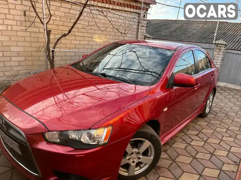 Хетчбек Mitsubishi Lancer 2010 null_content л. обл. Миколаївська, Южноукраїнськ - Фото 1/9